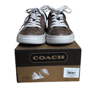 Coach woman’s Brown and White Sneakers